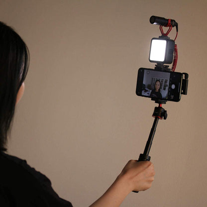 Ulanzi MT-08 handheld tripod with smartphone, LED light, and microphone for vlogging