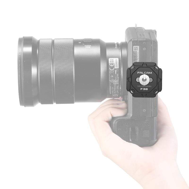 Falcam F38 Quick Release System attached to camera, black aluminum alloy.